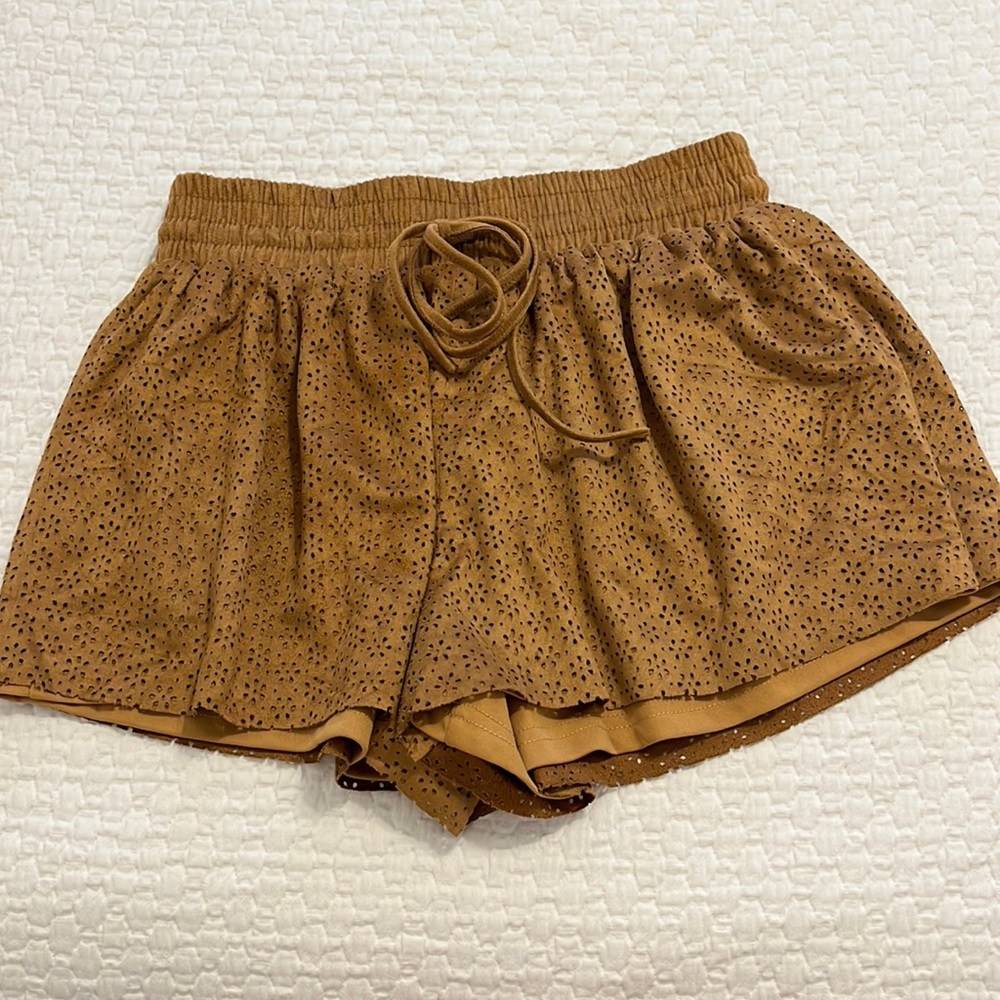 Burnt orange shorts with cut outs